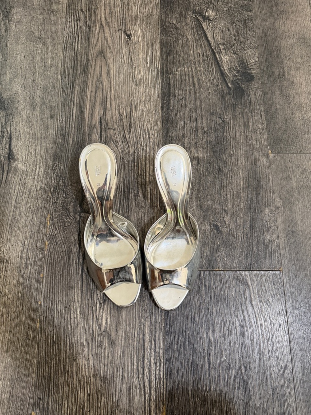 Metallic Silver Zara heels
Size 8